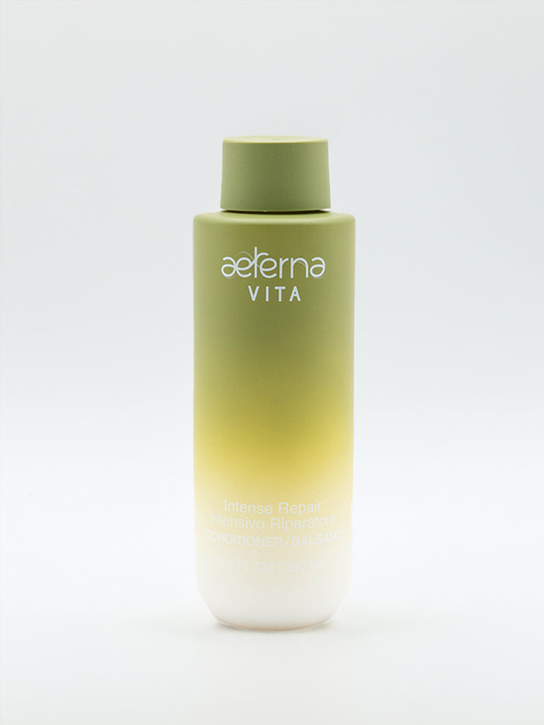 Cylindrical 250 ml conditioner bottle made with natural ingredients, sulfate and paraben-free, intense repair, made in Italy.